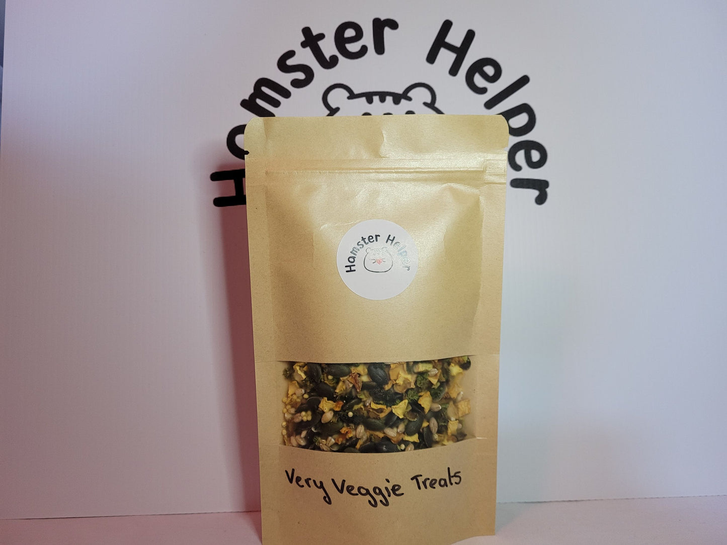 The very veggie treats mix in a pouch with the hamster helper sticker on it