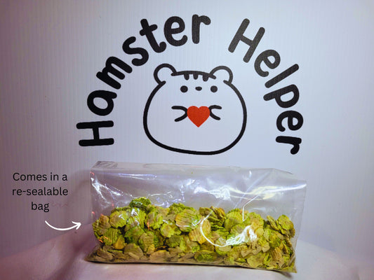 A picture of some hamster safe pea flakes in a re-sealable bag placed in front of the hamster helper logo