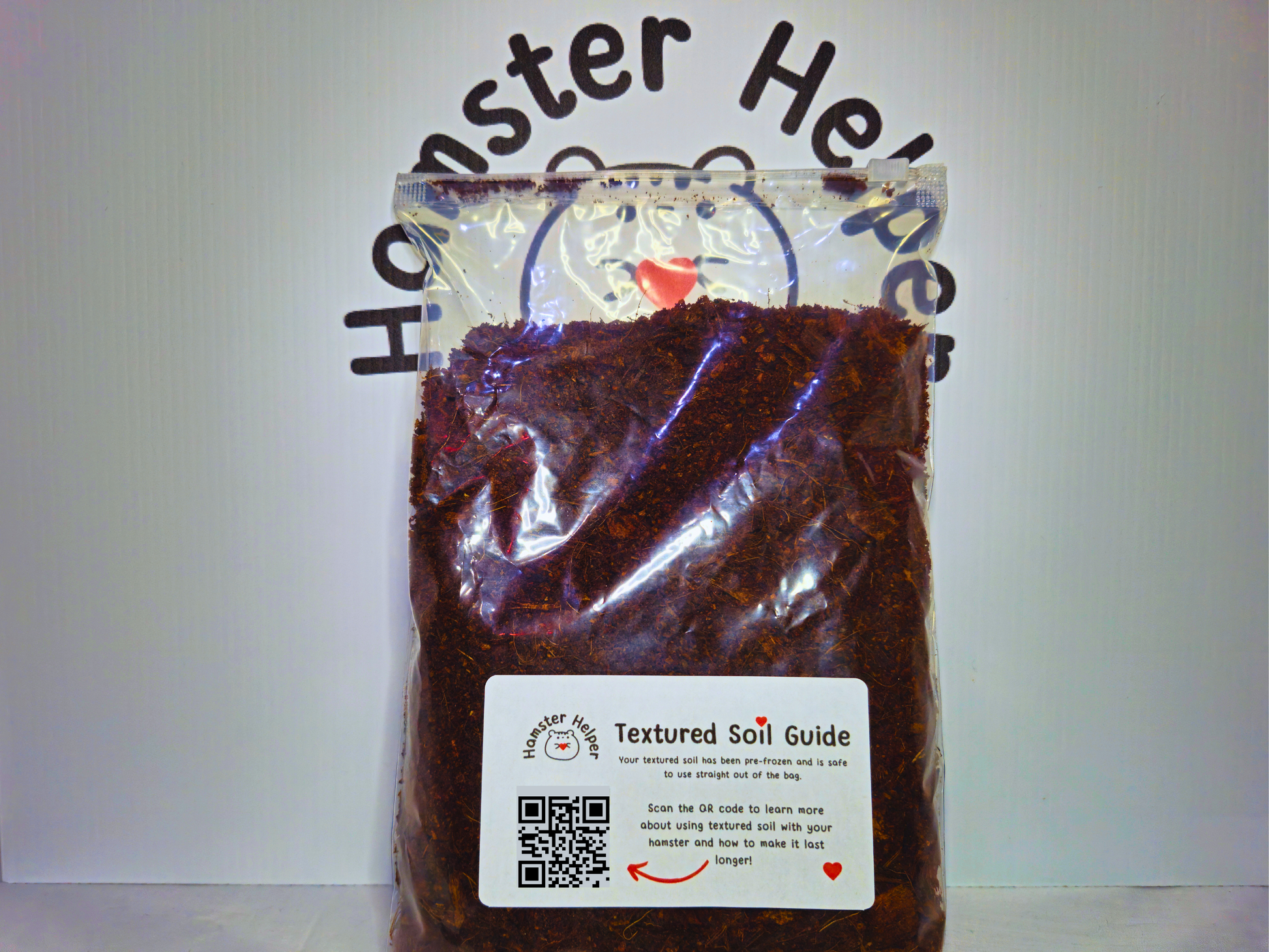 A bag of hamster safe textured soil showing how the textured soil is packaged.