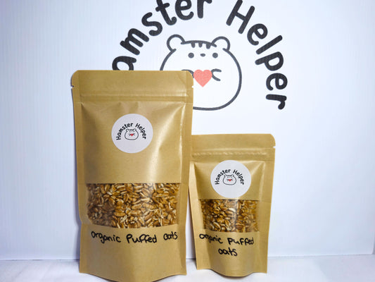 A large and small bag of hamster safe puffed oats.
