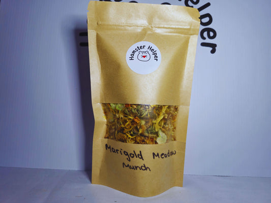 The marigold meadow munch hamster treat mix with a sticker of the Hamster Helper logo on it.