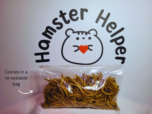 A re-sealable bag containing hamster safe meal worms in front of the hamster helper logo