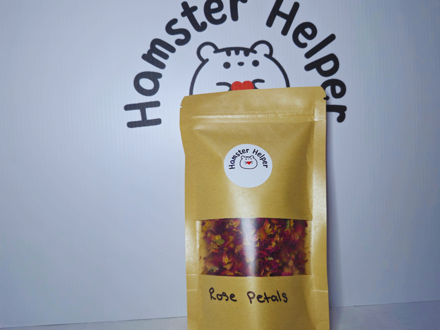 A pouch of hamster safe rose petals with a Hamster Helper sticker on it.