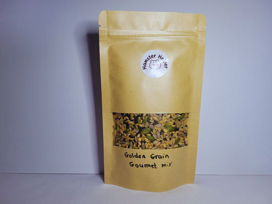 The golden grain gourmet hamster mix in a pouch against a plain background.