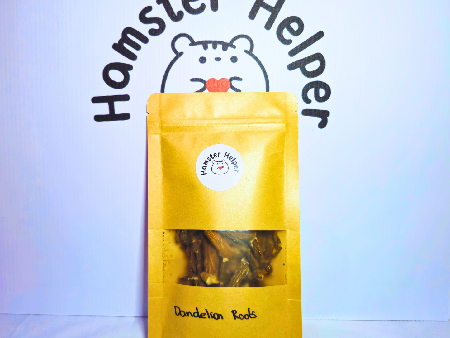 A bag of hamster safe dandelion roots with the Hamster Helper logo on them.